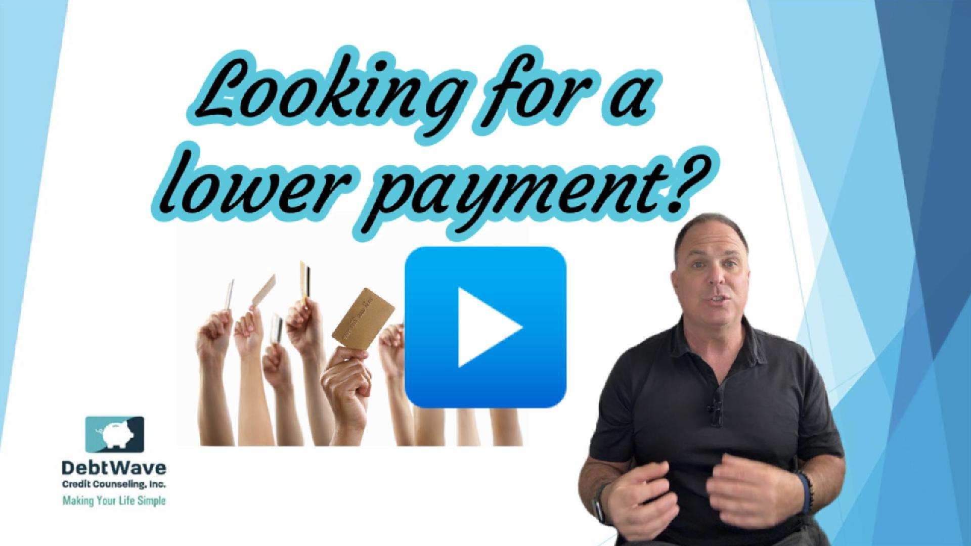 Looking for a Lower Payment cover Debtwave Video thumbnail presenter on the right crowd raising cards on the left with the text Looking for a lower payment and a play button in the center