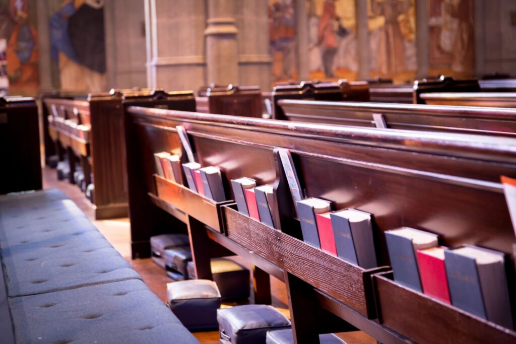 Church pews illustrating tithing on a budget and charitable giving